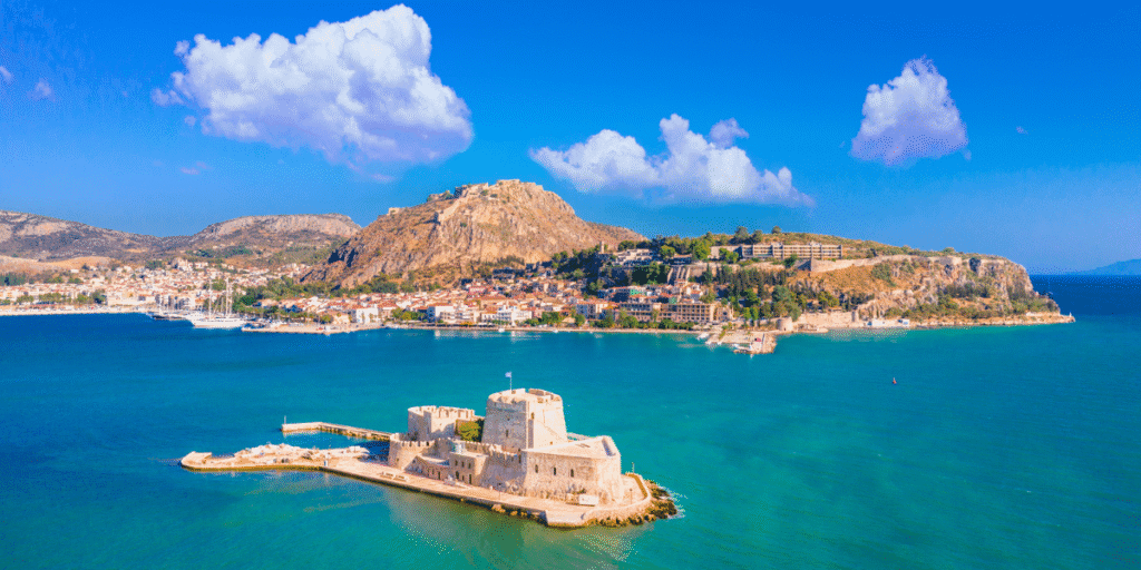 Skiathos International Airport (JSI / LGSK): aerial view of a coastal fortress surrounded by turquoise water in Greece