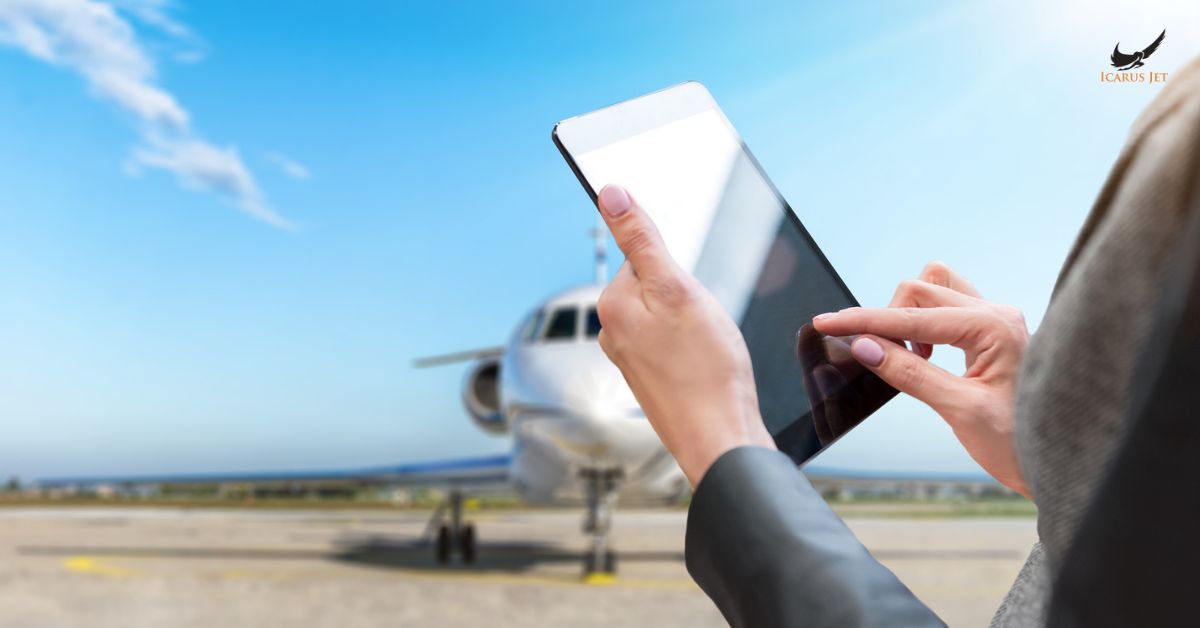 aviation professional using tablet near private jet on runway