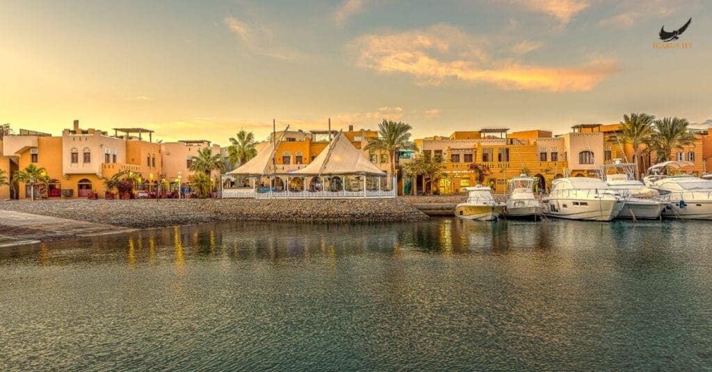 Acapulco International Airport (ACA / MMAA): luxury yacht dock with boats at sunset in a marina.