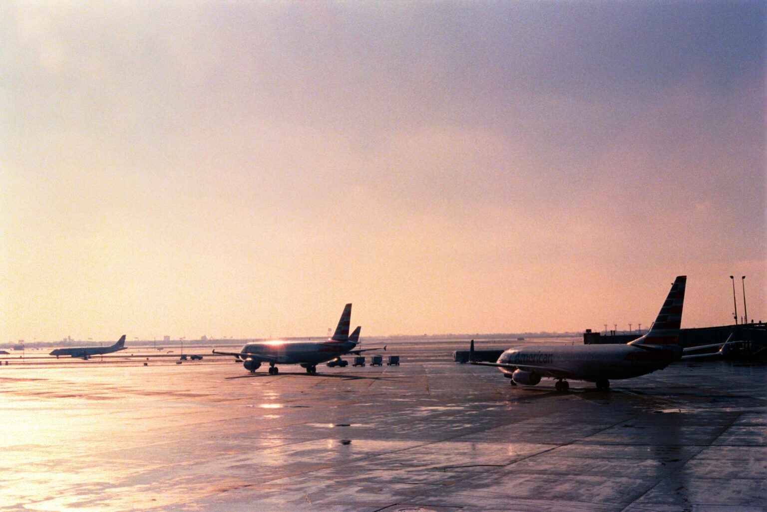Miami-Opa Locka Executive Airport (OPF / KOPF): aircraft parked on the ramp at dawn under a clear sky